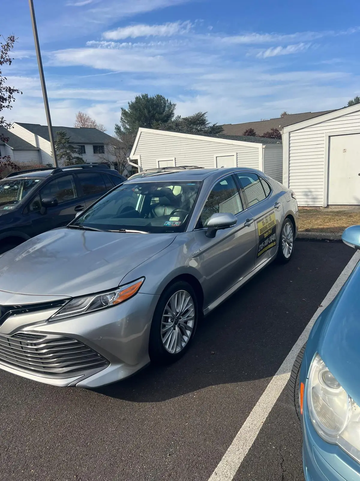 Front view of the silver dual-control Camry used for highway lessons