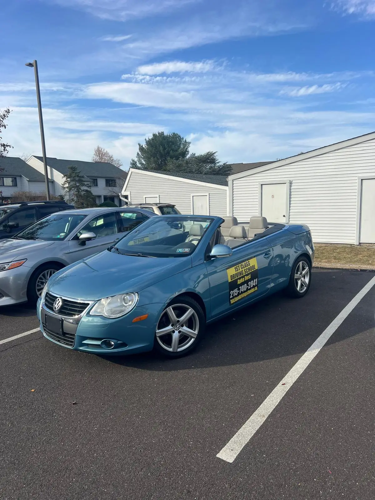 Dual-control training car under a clear Pennsylvania sky